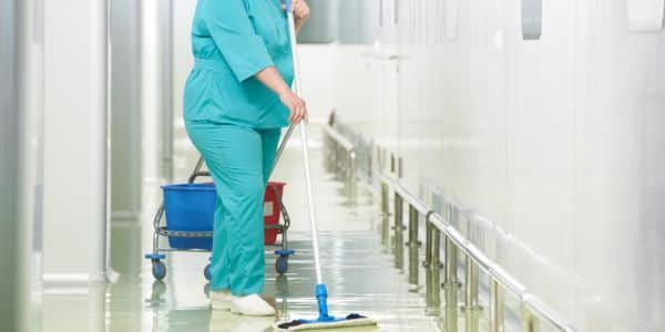 Hospital floor care and cleaning; janitor mopping healthcare floor